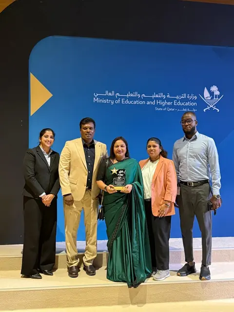The Greenwood team with the award at the Ministry of Education and Higher Education
