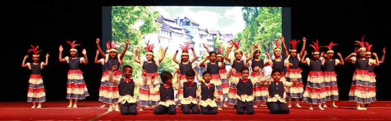 Students performing a European folk dance