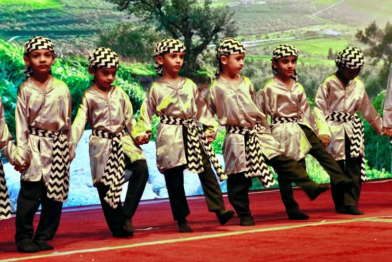 Students performing a traditional folk dance